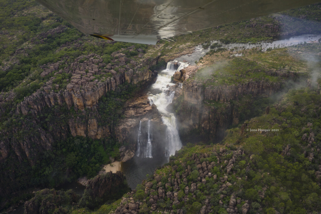 Twin Falls. The only means of seeing the falls during the Wet Season is by air as the walking tracks are closed.